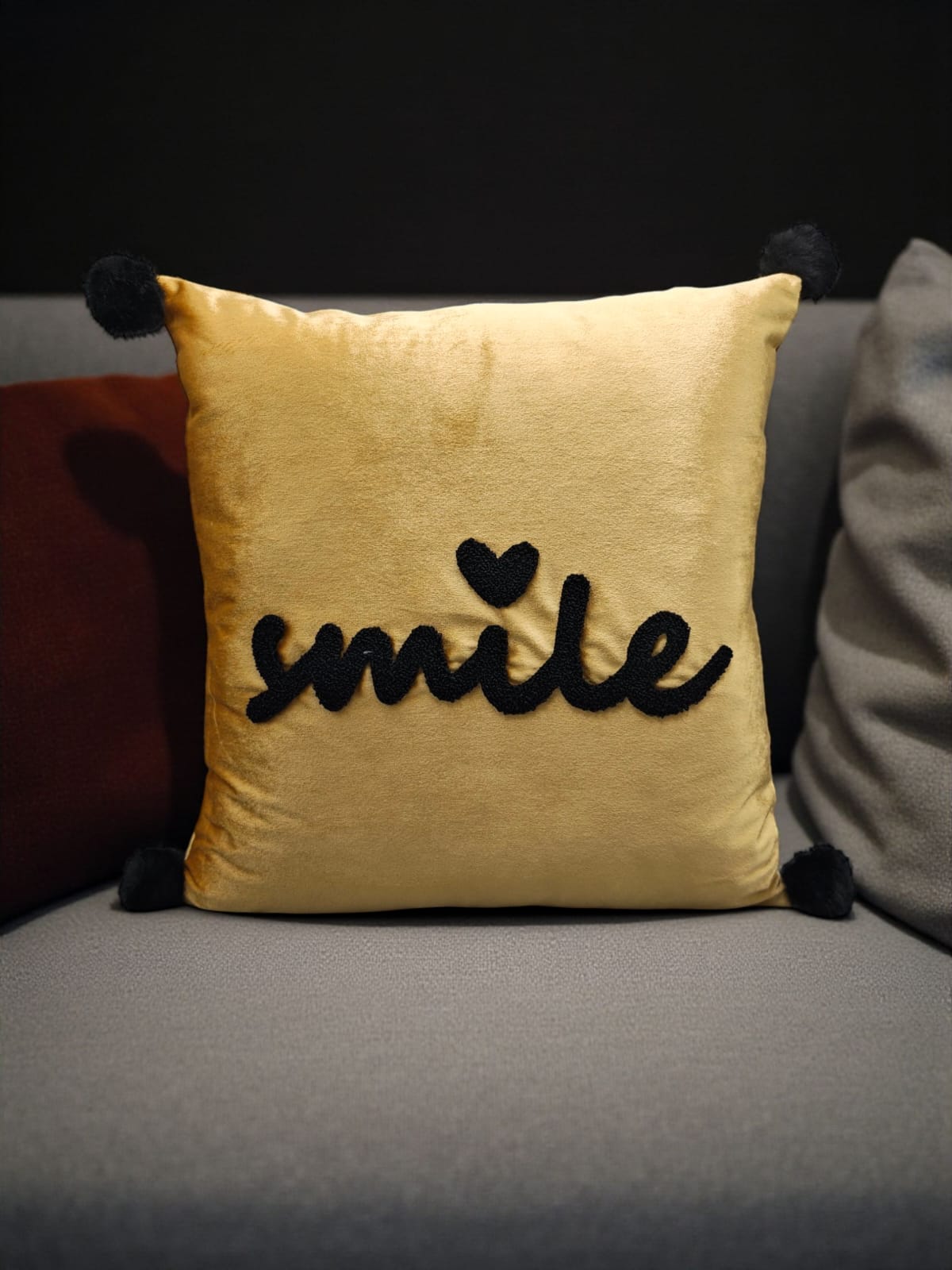Velvet Decorative Cushion with Pom-Pom Corners & Embroidered ‘Smile’ Text – Soft Throw Pillow for Sofa & Bedroom