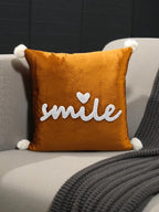 Velvet Decorative Cushion with Pom-Pom Corners & Embroidered ‘Smile’ Text – Soft Throw Pillow for Sofa & Bedroom