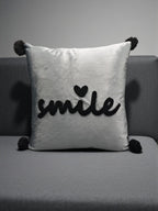 Velvet Decorative Cushion with Pom-Pom Corners & Embroidered ‘Smile’ Text – Soft Throw Pillow for Sofa & Bedroom